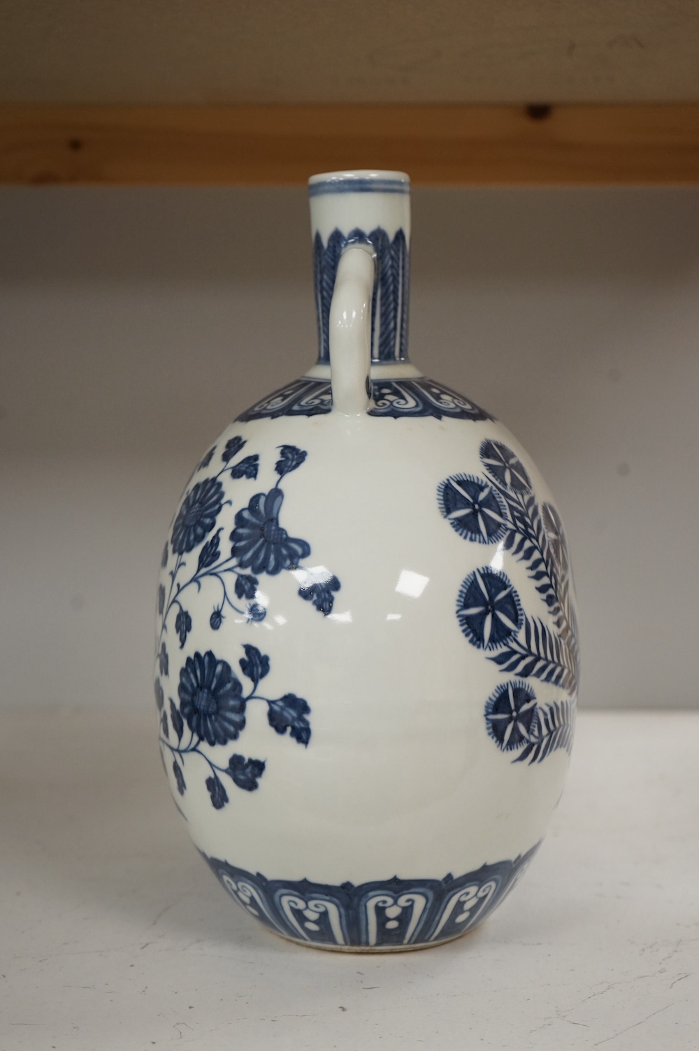 A Chinese blue and white moonflask, Yongzheng mark but later, 27cm. Condition - good